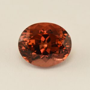 OrangeTourmaline oval 12.3x10.3mm 6.33cts N tm257