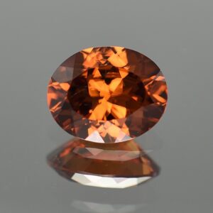 OrangeZircon oval 10.6x8.6mm 4.38cts zn3192