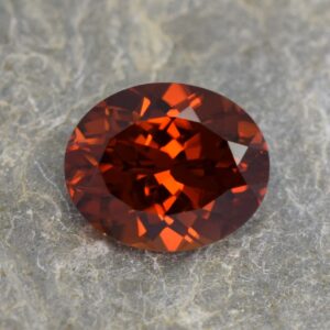 OrangeZircon oval 11.6x9.6mm 6.39cts zn1612