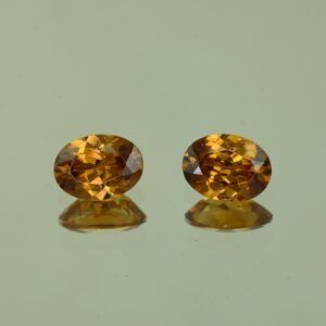 OrangeZircon oval pair 8.1x6.0mm 3.45cts N zn4219