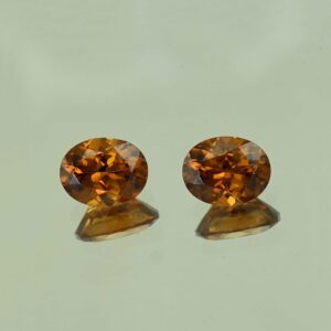 OrangeZircon oval pair 9.6x7.5mm 6.78cts N zn4225 scaled 1