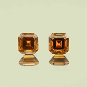 OrangeZircon sq eme cut pair 6.5mm 4.60cts N zn7624 scaled 1