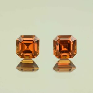 OrangeZircon sq eme cut pair 6.5mm 4.61cts N zn7625 scaled 1