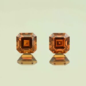 OrangeZircon sq eme cut pair 6.5mm 4.65cts N zn7626 scaled 1