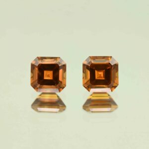OrangeZircon sq eme cut pair 7.0mm 5.77cts N zn7630 scaled 1