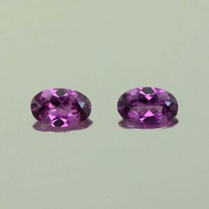 PurpleGarnet oval pair 5.5x3.5mm 0.68cts N pl721 scaled 1