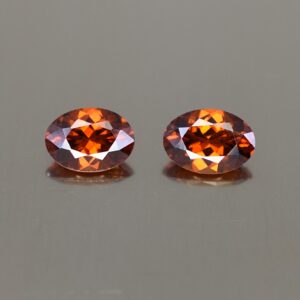 RedOrangeZircon oval pair 6.8x4.8mm 1.92cts N zn2801