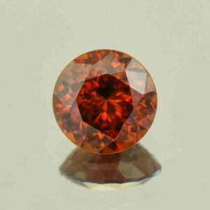 RedOrangeZircon round 9.5mm 4.86cts N zn6622