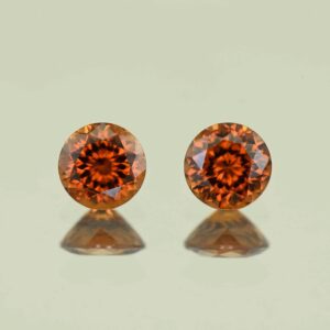 RedOrangeZircon round pair 6.0mm 2.56cts N zn7732 scaled 1