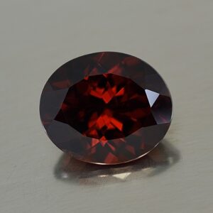 RedZircon oval 13.5x11.5mm 10.46cts zn558
