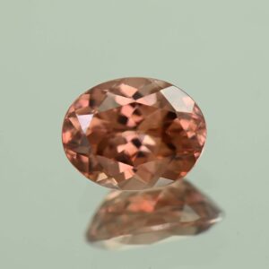 RoseZircon oval 9.4x7.4mm 3.44cts H zn7246