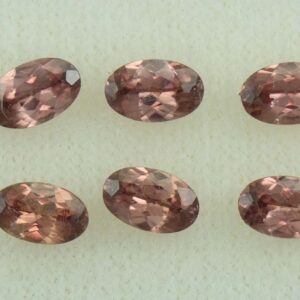 RoseZircon oval box set 5.5x3.5mm 4.30cts H zn5937