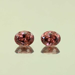 RoseZircon oval pair 10.1x8.0mm 8.61cts H zn3068