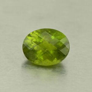Vesuvianite ch oval 10.6x8.5mm 3.47cts N vs239