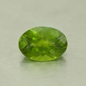 Vesuvianite ch oval 12.3x8.7mm 3.92cts N vs242