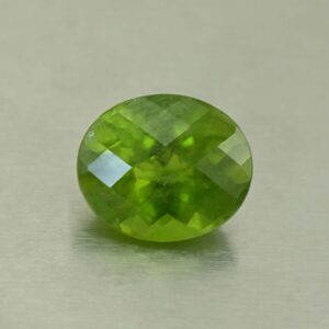 Vesuvianite ch oval 13.2x11.2mm 7.06cts N vs244