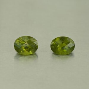 Vesuvianite ch oval pair 9.1x7.1mm 4.01cts N vs251