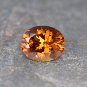 YellowOrangeZircon oval 11.1x9.0mm 5.90cts N zn649 SOLD