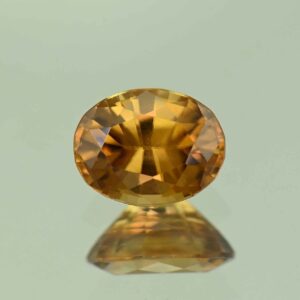 YellowOrangeZircon oval 7.5x5.8mm 1.61cts N zn7526