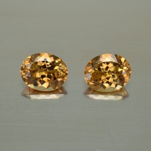 YellowOrangeZircon oval pair 10.1x8.0mm 8.25cts N zn463