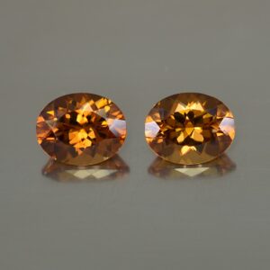 YellowOrangeZircon oval pair 10.1x8.1mm 8.00cts N zn461