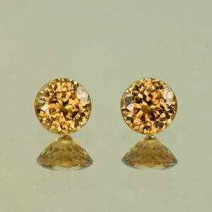 YellowOrangeZircon round pair 5.0mm 1.58cts N zn4105