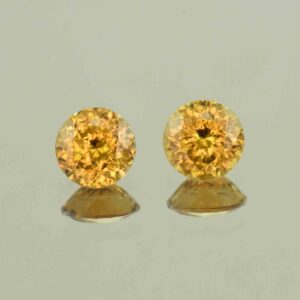 YellowOrangeZircon round pair 7.0mm 3.82cts N zn6640