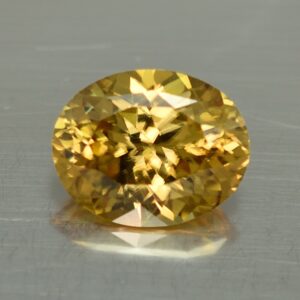 YellowZircon oval 12.2x9.8mm 6.90cts zn380