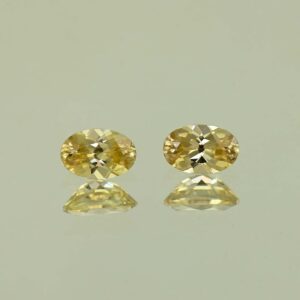 YellowZircon oval pair 6.0x4.0mm 1.35cts H zn3836