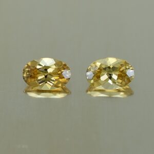 YellowZircon oval pair 6.0x4.0mm 1.36cts zn2668