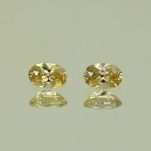 YellowZircon oval pair 6.0x4.0mm 1.39cts H zn3835