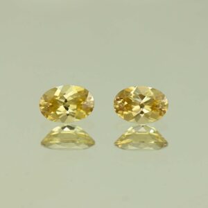 YellowZircon oval pair 6.5x4.5mm 1.71cts H zn3837
