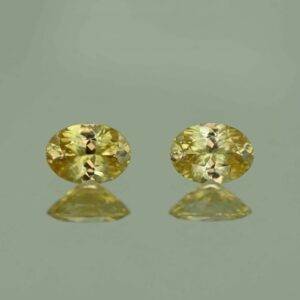 YellowZircon oval pair 6.5x4.8mm 1.71cts H zn3796 scaled 1