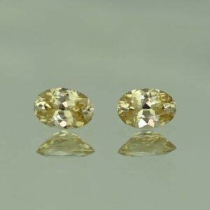 YellowZircon oval pair 6.6x4.6mm 1.67cts H zn3795