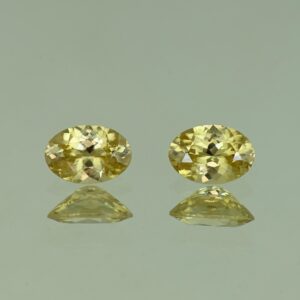 YellowZircon oval pair 6.8x4.8mm 1.84cts H zn3801