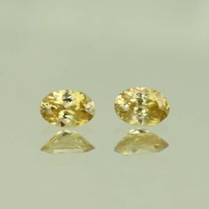YellowZircon oval pair 6.8x4.8mm 1.84cts H zn3838