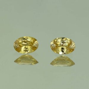 YellowZircon oval pair 6.8x4.8mm 1.85cts H zn3802
