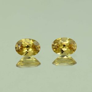 YellowZircon oval pair 7.0x5.0mm 2.15cts H zn3797