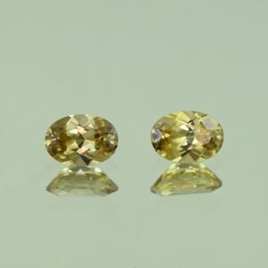 YellowZircon oval pair 7.0x5.0mm 2.17cts H zn3803