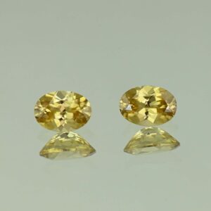 YellowZircon oval pair 7.0x5.0mm 2.22cts H zn3799