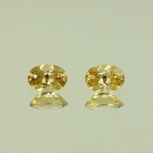 YellowZircon oval pair 7.0x5.0mm 2.23cts H zn3839