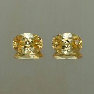 YellowZircon oval pair 7.0x5.0mm 2.23cts zn2671