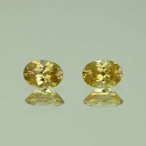 YellowZircon oval pair 7.0x5.0mm 2.32cts H zn3798