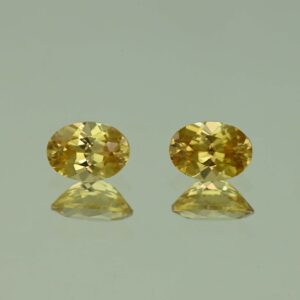 YellowZircon oval pair 7.0x5.0mm 2.38cts H zn3800