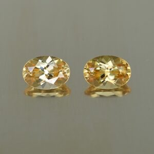 YellowZircon oval pair 7.1x5.1mm 2.47cts zn2691