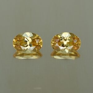 YellowZircon oval pair 7.1x5.1mm 2.49cts zn2673