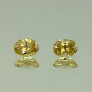 YellowZircon oval pair 7.5x5.5mm 2.95cts H zn3808