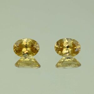 YellowZircon oval pair 7.5x5.5mm 3.01cts H zn3809