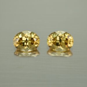 YellowZircon oval pair 9.0x7.0mm 6.02cts zn662