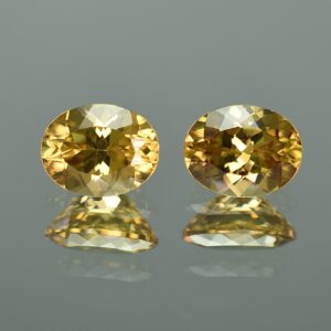 YellowZircon oval pair 9.5x7.5mm 6.79cts zn1927